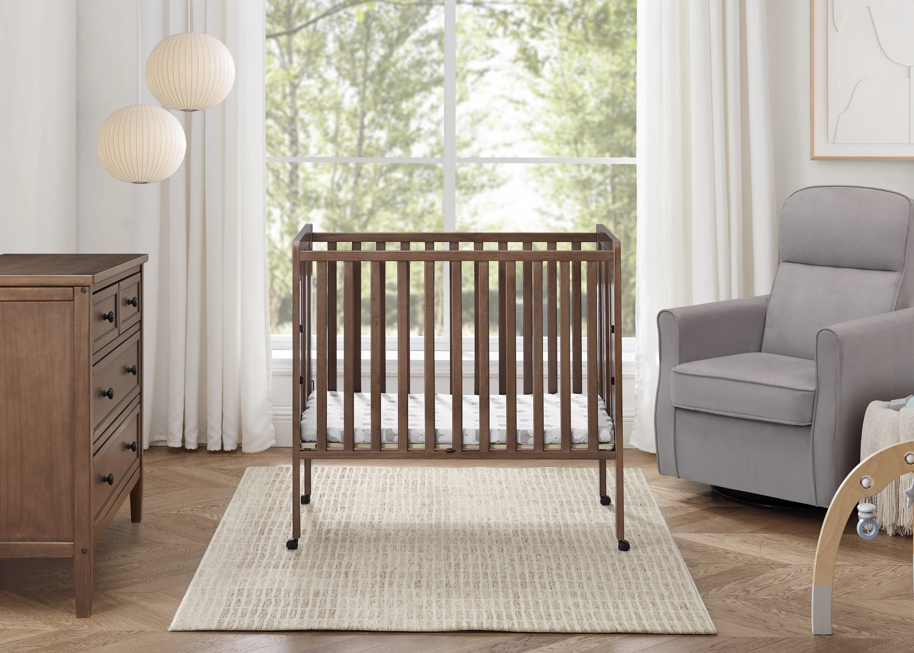 Delta Children Lee Portable Folding Mini Crib with 1.5-Inch Mattress - Greenguard Gold Certified, Bianca White