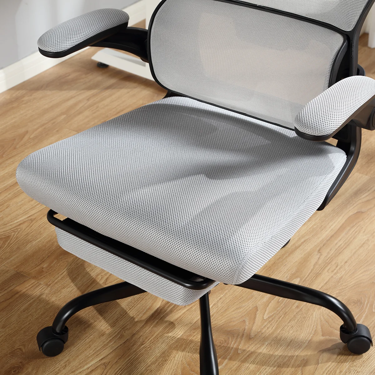 Mainstays Ergonomic Height Adjustable Mesh Office Chair for Teens and Adults with Lumbar Support and Tilt Function, with Leg Rest, Black